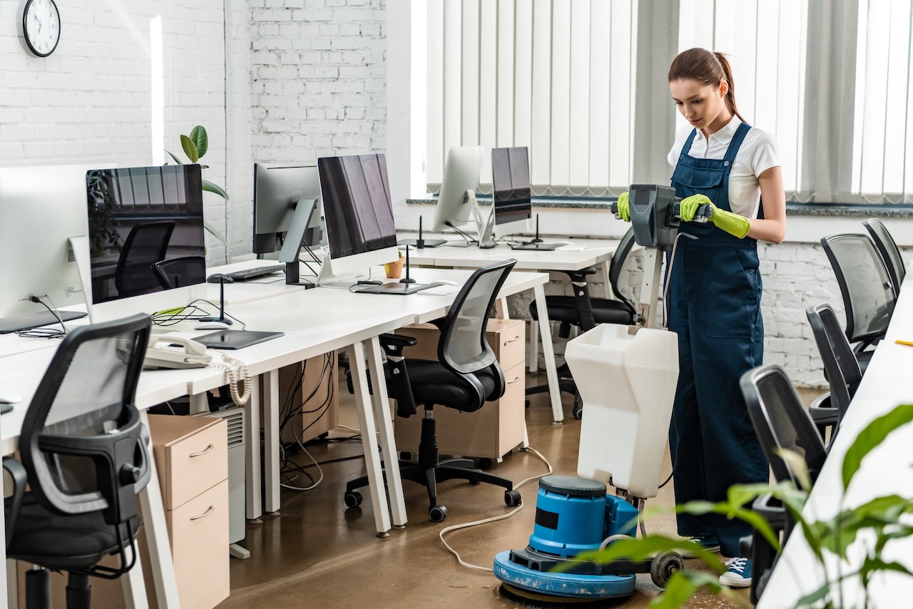 Texas Sparkle cleaner buffing an office floor in San Antonio