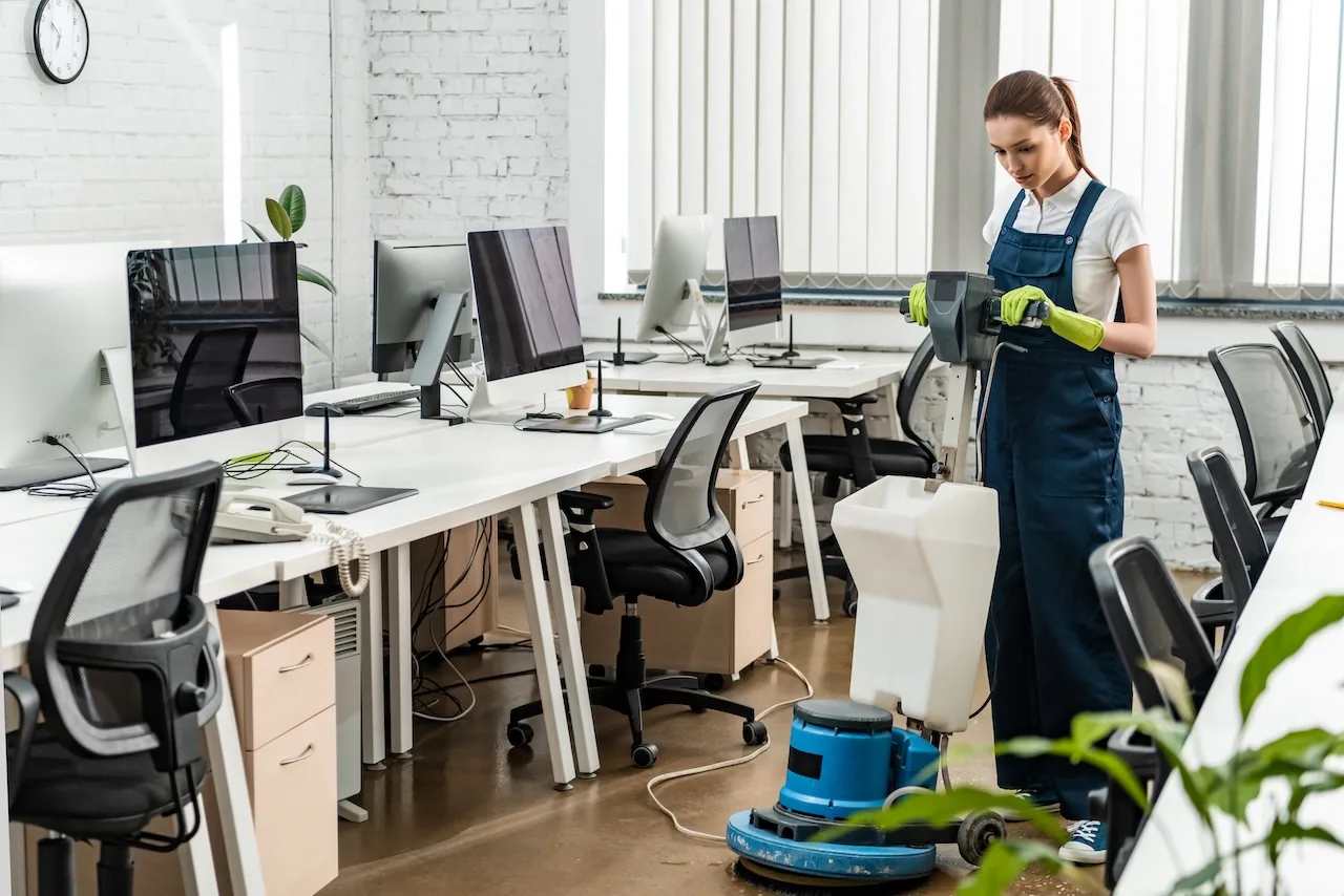 Texas Sparkle cleaner buffing an office floor in San Antonio
